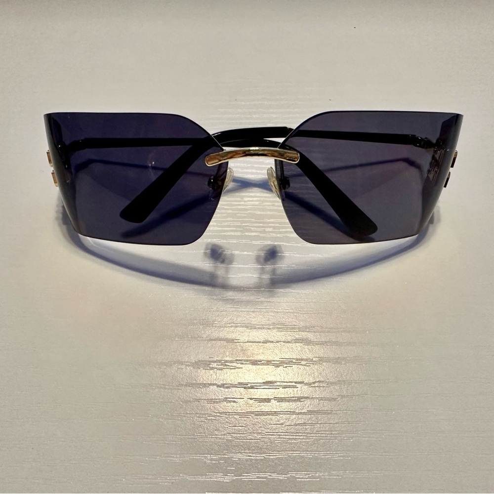Miu Miu Black Sunglasses with Gold Accent